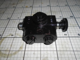 Кран распределитель шнека 1021498